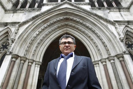 Property magnate Vincent Tchenguiz poses for a photograph as he arrives at the High Court in London March 16, 2011. REUTERS/Andrew Winning Property magnate Vincent Tchenguiz poses for a photograph as he arrives at the High Court in London March 16, 2011. REUTERS/Andrew Winning