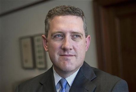 President and CEO of the Federal Reserve Bank of St. Louis James Bullard poses during an interview at the Federal Reserve Bank of St. Louis President and CEO of the Federal Reserve Bank of St. Louis James Bullard poses during an interview at the Federal Reserve Bank of St. Louis