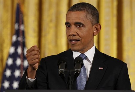 U.S. President Barack Obama gestures while addressing his first news conference since his reelection, at the White House in Washington Novem U.S. President Barack Obama gestures while addressing his first news conference since his reelection, at the White House in Washington Novem