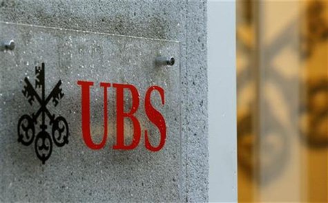The company's logo is placed in front of an office of Swiss bank UBS in Zurich December 4, 2012. REUTERS/Arnd Wiegmann The company's logo is placed in front of an office of Swiss bank UBS in Zurich December 4, 2012. REUTERS/Arnd Wiegmann