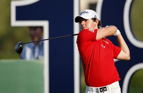 Rory McIlroy of Northern Ireland watches his shot from the 18th tee during the final round of the DP World Tour Championship at Jumeirah Gol Rory McIlroy of Northern Ireland watches his shot from the 18th tee during the final round of the DP World Tour Championship at Jumeirah Gol
