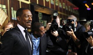 Actor Eddie Murphy (L) poses as he arrives for the taping of the Spike TV special tribute "Eddie Murphy: One Night Only" at the Saban theatr Actor Eddie Murphy (L) poses as he arrives for the taping of the Spike TV special tribute "Eddie Murphy: One Night Only" at the Saban theatr