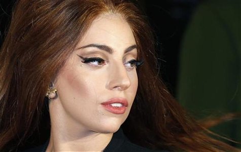 Lady Gaga arrives for the UK launch of her new fragrance "Fame" outside Harrods in London October 7, 2012. REUTERS/Suzanne Plunkett Lady Gaga arrives for the UK launch of her new fragrance "Fame" outside Harrods in London October 7, 2012. REUTERS/Suzanne Plunkett