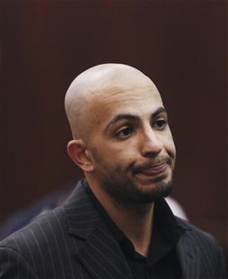 Algerian-born Ahmed Ferhani stands before a judge during his arraignment in Manhattan criminal court in New York May 12, 2011. REUTERS/Lucas Algerian-born Ahmed Ferhani stands before a judge during his arraignment in Manhattan criminal court in New York May 12, 2011. REUTERS/Lucas