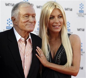 Hugh Hefner and his fiancee, Playboy Playmate Crystal Harris, arrive at the opening night gala of the 2011 TCM Classic Film Festival featuri Hugh Hefner and his fiancee, Playboy Playmate Crystal Harris, arrive at the opening night gala of the 2011 TCM Classic Film Festival featuri