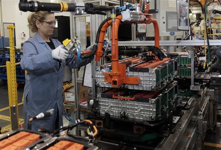 A Ford Motor production worker assembles batteries for Ford electric and hybrid vehicles at the Ford Rawsonville Assembly Plant in Ypsilanti A Ford Motor production worker assembles batteries for Ford electric and hybrid vehicles at the Ford Rawsonville Assembly Plant in Ypsilanti