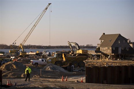 Construction workers repair roads destroyed by Hurricane Sandy, one month after the storm made landfall, in Mantoloking, New Jersey, Novembe Construction workers repair roads destroyed by Hurricane Sandy, one month after the storm made landfall, in Mantoloking, New Jersey, Novembe