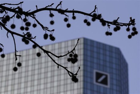 The logo of Germany's largest business bank, Deutsche Bank, is seen at the bank's headquarters behind twigs in Frankfurt January 31, 2012. R The logo of Germany's largest business bank, Deutsche Bank, is seen at the bank's headquarters behind twigs in Frankfurt January 31, 2012. R