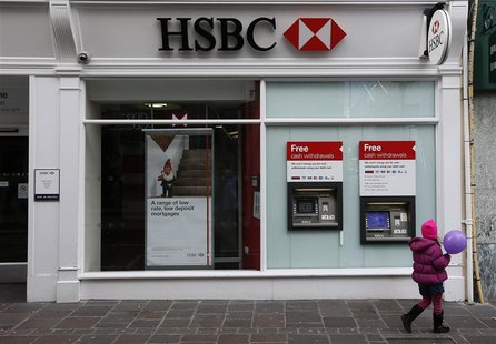 A girl holding a balloon walks past a bank branch of HSBC in St Helier, Jersey November 11, 2012. REUTERS/Stefan Wermuth A girl holding a balloon walks past a bank branch of HSBC in St Helier, Jersey November 11, 2012. REUTERS/Stefan Wermuth