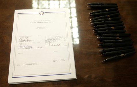 The Washington state bill legalizing gay marriage in the state lies on a table before it is signed by Governor Christine Gregoire, in Olympi The Washington state bill legalizing gay marriage in the state lies on a table before it is signed by Governor Christine Gregoire, in Olympi