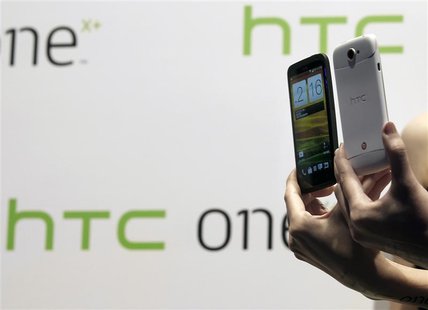 New HTC smartphones, the HTC One X+ (L) and HTC One S Special Edition, are presented during a news conference for the launch of the products New HTC smartphones, the HTC One X+ (L) and HTC One S Special Edition, are presented during a news conference for the launch of the products