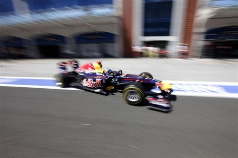 Red Bull Formula One driver Sebastian Vettel of Germany drives after a pit stop in the qualifying session of the Turkish F1 Grand Prix at th Red Bull Formula One driver Sebastian Vettel of Germany drives after a pit stop in the qualifying session of the Turkish F1 Grand Prix at th