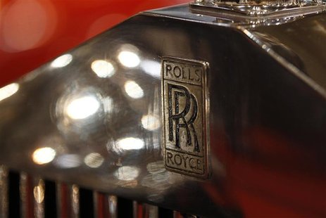 The logo of a Rolls Royce is pictured during a press presentation prior to the Essen Motor Show in Essen November 30, 2012. REUTERS/Ina Fass The logo of a Rolls Royce is pictured during a press presentation prior to the Essen Motor Show in Essen November 30, 2012. REUTERS/Ina Fass