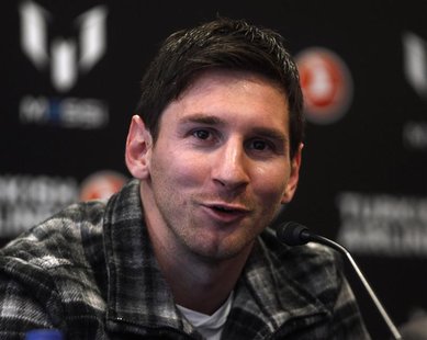 Barcelona's Lionel Messi speaks during a news conference at Nou Camp Stadium in Barcelona, December 6, 2012. REUTERS/Gustau Nacarino Barcelona's Lionel Messi speaks during a news conference at Nou Camp Stadium in Barcelona, December 6, 2012. REUTERS/Gustau Nacarino