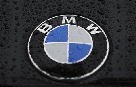 A logo of BMW is pictured on a car before the German luxury carmaker BMW annual shareholders meeting at the company's headquarters in Munich A logo of BMW is pictured on a car before the German luxury carmaker BMW annual shareholders meeting at the company's headquarters in Munich