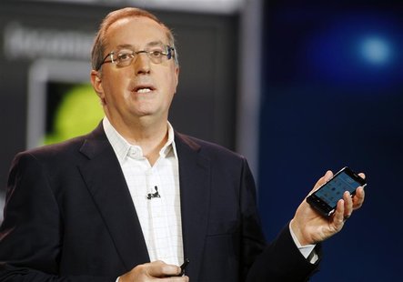 Paul Otellini, president and CEO of Intel Corporation, holds an Intel smartphone reference design as he gives a keynote address during the 2 Paul Otellini, president and CEO of Intel Corporation, holds an Intel smartphone reference design as he gives a keynote address during the 2