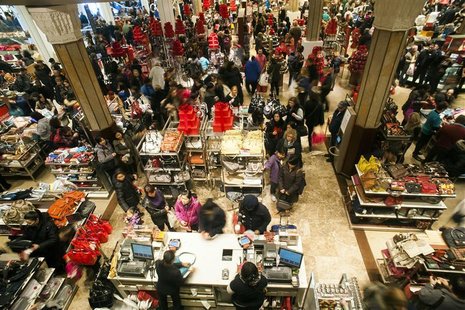 Shoppers look over items on sale at a Macy's store in New York, November 23, 2012. REUTERS/Keith Bedford Shoppers look over items on sale at a Macy's store in New York, November 23, 2012. REUTERS/Keith Bedford