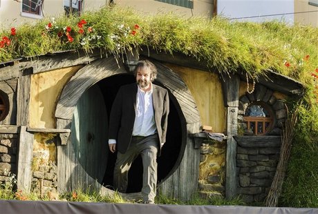 New Zealand director Peter Jackson emerges from a 'Hobbit Hole' to make an address at the world premiere of 'The Hobbit - An Unexpected Jour New Zealand director Peter Jackson emerges from a 'Hobbit Hole' to make an address at the world premiere of 'The Hobbit - An Unexpected Jour