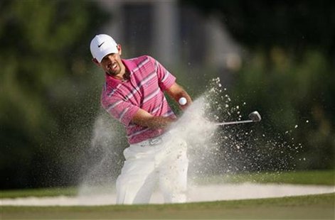 Charl Schwartzel of South Africa hits out of a bunker on the 17th hole during the final round of the DP World Tour Championship at Jumeirah Charl Schwartzel of South Africa hits out of a bunker on the 17th hole during the final round of the DP World Tour Championship at Jumeirah