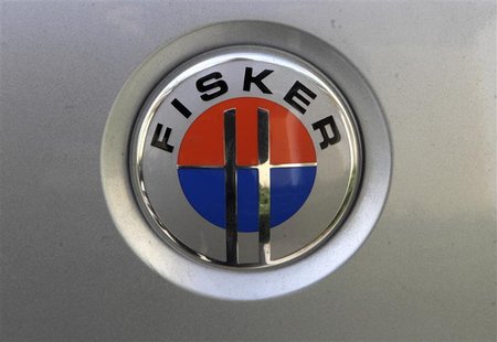 The logo of an extended rage electric vehicle Fisker Karma is pictured at the start of an electric car rally from Tallinn to Monte-Carlo in The logo of an extended rage electric vehicle Fisker Karma is pictured at the start of an electric car rally from Tallinn to Monte-Carlo in