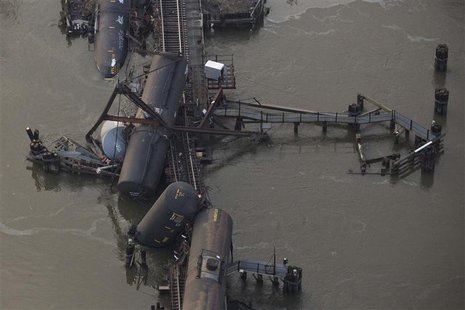 Derailed freight train cars sit semi-submerged in the waters of Mantua Creek after a train crash, in Paulsboro, New Jersey, in this November Derailed freight train cars sit semi-submerged in the waters of Mantua Creek after a train crash, in Paulsboro, New Jersey, in this November