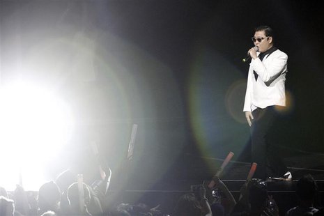 South Korean rapper Psy performs at KIIS FM's Jingle Ball concert in Los Angeles, California December 3, 2012. REUTERS/Mario Anzuoni South Korean rapper Psy performs at KIIS FM's Jingle Ball concert in Los Angeles, California December 3, 2012. REUTERS/Mario Anzuoni