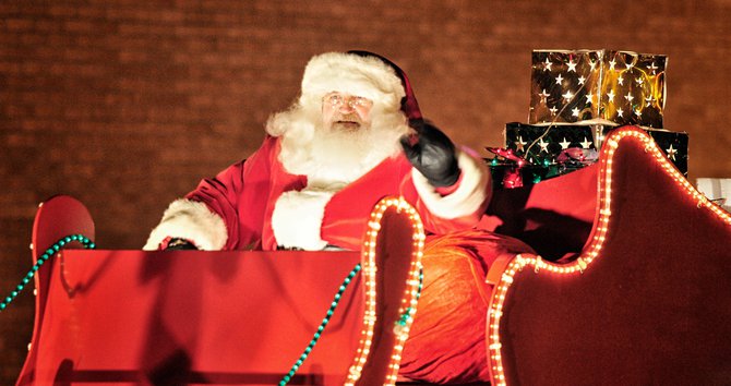 Santa working the wave!! Great Job Santa!