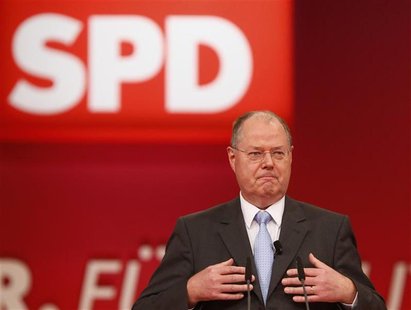 Designated top candidate of the German Social Democratic Party (SPD) for the 2013 German general elections, Peer Steinbrueck speaks during t Designated top candidate of the German Social Democratic Party (SPD) for the 2013 German general elections, Peer Steinbrueck speaks during t