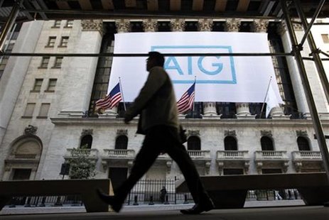A banner for American International Group Inc (AIG) hangs on the facade of the New York Stock Exchange, Ocotber 16, 2012. REUTERS/Brendan Mc A banner for American International Group Inc (AIG) hangs on the facade of the New York Stock Exchange, Ocotber 16, 2012. REUTERS/Brendan Mc