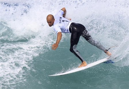 Ten-time ASP World Surfing Champuion Kelly Slater of the U.S. surfs during the men's Association of Surfing Professionals (ASP) Billabong Ri Ten-time ASP World Surfing Champuion Kelly Slater of the U.S. surfs during the men's Association of Surfing Professionals (ASP) Billabong Ri