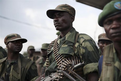Government army FARDC soldiers stand in a military base in Goma December 3, 2012. REUTERS/Goran Tomasevic Government army FARDC soldiers stand in a military base in Goma December 3, 2012. REUTERS/Goran Tomasevic
