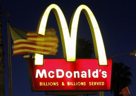 A U.S. flags flutters in the wind in front of a sign for a McDonald's restaurant in Los Angeles in this April 4, 2011 file photo. REUTERS/Ma A U.S. flags flutters in the wind in front of a sign for a McDonald's restaurant in Los Angeles in this April 4, 2011 file photo. REUTERS/Ma