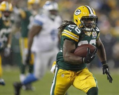 CONTINUING THE MISERY: Green Bay Packers running back DuJuan Harris scores the winning touchdown against the Detroit Lions at the 4:15 mark of the fourth quarter of a NFL football game in Green Bay, Wisconsin December 9, 2012. REUTERS/Darren Hauck CONTINUING THE MISERY: Green Bay Packers running back DuJuan Harris scores the winning touchdown against the Detroit Lions at the 4:15 mark of the fourth quarter of a NFL football game in Green Bay, Wisconsin December 9, 2012. REUTERS/Darren Hauck