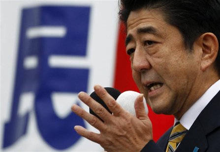 Japan's main opposition Liberal Democratic Party's (LDP) leader and former Prime Minister Shinzo Abe speaks to voters during his official ca Japan's main opposition Liberal Democratic Party's (LDP) leader and former Prime Minister Shinzo Abe speaks to voters during his official ca