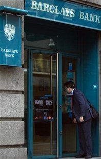 A man looks inside a Barclays bank branch in Madrid March 8, 2011. REUTERS/Sergio Perez A man looks inside a Barclays bank branch in Madrid March 8, 2011. REUTERS/Sergio Perez