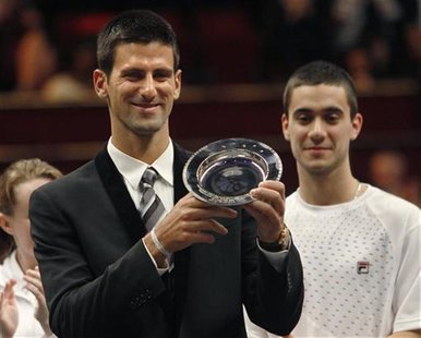 Serbian tennis player Novak Djokovic with the "Centrepoint Premier Award for Contribution to the Lives of Youth Across the World" in recogni Serbian tennis player Novak Djokovic with the "Centrepoint Premier Award for Contribution to the Lives of Youth Across the World" in recogni