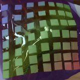A stretchable material containing squared stiff islands for the protection of brittle electronic devices is pictured in this handout photo. A stretchable material containing squared stiff islands for the protection of brittle electronic devices is pictured in this handout photo.