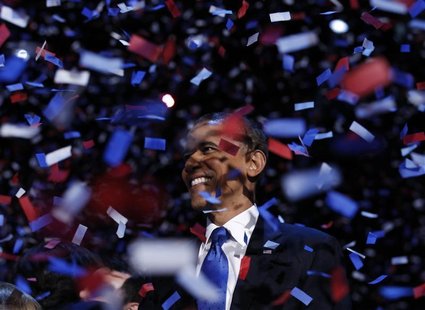 U.S. President Barack Obama celebrates on stage as confetti falls after his victory speech during his election rally in Chicago, November 6, U.S. President Barack Obama celebrates on stage as confetti falls after his victory speech during his election rally in Chicago, November 6,