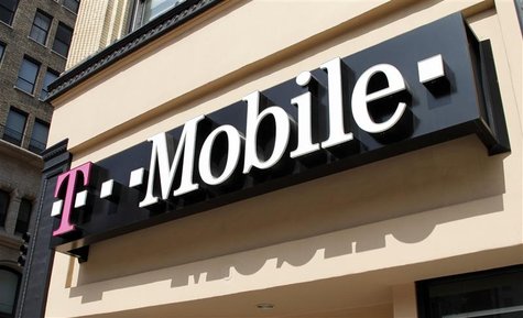 Signage for a T-Mobile store is pictured in downtown Los Angeles, California in this August 31, 2011, file photo. REUTERS/Fred Prouser/Files Signage for a T-Mobile store is pictured in downtown Los Angeles, California in this August 31, 2011, file photo. REUTERS/Fred Prouser/Files