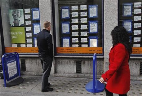 A man looks at adverts posted in the window of a recruitment agency in London March 14, 2012. REUTERS/Luke MacGregor A man looks at adverts posted in the window of a recruitment agency in London March 14, 2012. REUTERS/Luke MacGregor