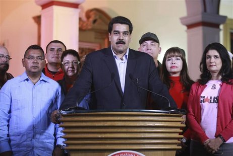Venezuela's vice President Nicolas Maduro (C) flanked by cabinet members statement about President Hugo Chavez's cancer surgery in Caracas D Venezuela's vice President Nicolas Maduro (C) flanked by cabinet members statement about President Hugo Chavez's cancer surgery in Caracas D