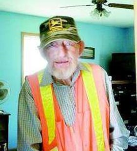 The late Gerald Quimby is his much-known orange vest. Courtesy photo