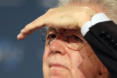 Italy's Prime Minister Mario Monti gestures at the World Policy Conference in Cannes December 8, 2012. The World Policy Conference is devote Italy's Prime Minister Mario Monti gestures at the World Policy Conference in Cannes December 8, 2012. The World Policy Conference is devote