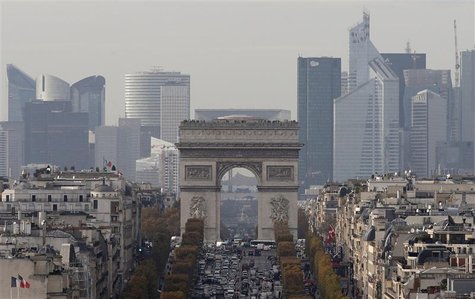 The skyline of La Defense is seen behind Paris' landmark, the Arc de Triomphe, November 20, 2012. REUTERS/Christian Hartmann The skyline of La Defense is seen behind Paris' landmark, the Arc de Triomphe, November 20, 2012. REUTERS/Christian Hartmann