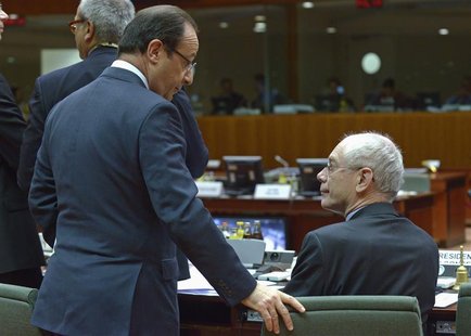 France's President Francois Hollande (L) talks with European Council President Herman Van Rompuy during a European Union leaders summit, in France's President Francois Hollande (L) talks with European Council President Herman Van Rompuy during a European Union leaders summit, in