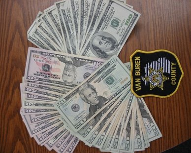Money seized in Dec. 13, 2012 bust on I-94 near Paw Paw (photo courtesy Van Buren County Sheriff's Department) Money seized in Dec. 13, 2012 bust on I-94 near Paw Paw (photo courtesy Van Buren County Sheriff's Department)