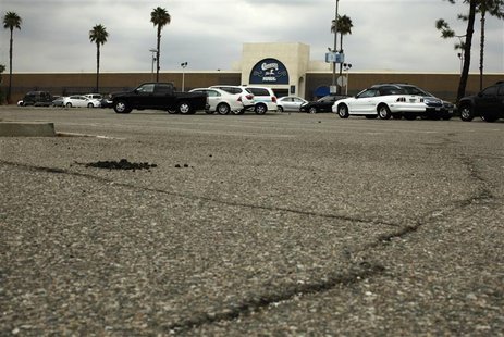 Cracks in the parking lot are seen in front of the Carousel shopping mall in San Bernardino, California September 11, 2012. REUTERS/Lucy Nic Cracks in the parking lot are seen in front of the Carousel shopping mall in San Bernardino, California September 11, 2012. REUTERS/Lucy Nic