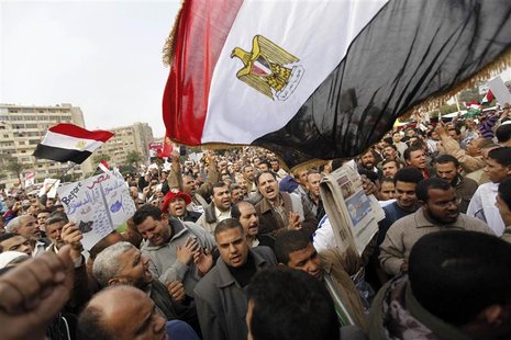 Supporters of Egyptian President Mohamed Mursi and members of the Muslim Brotherhood chant pro-Mursi slogans during a rally in Rabaa El Adaw Supporters of Egyptian President Mohamed Mursi and members of the Muslim Brotherhood chant pro-Mursi slogans during a rally in Rabaa El Adaw