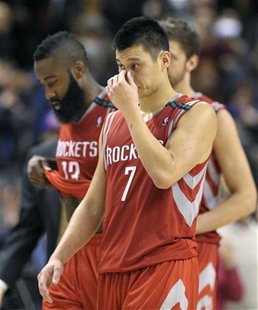 Houston Rockets guard Jeremy Lin and James Harden (L) walk of the court after losing their NBA basketball game against the Toronto Raptors i Houston Rockets guard Jeremy Lin and James Harden (L) walk of the court after losing their NBA basketball game against the Toronto Raptors i