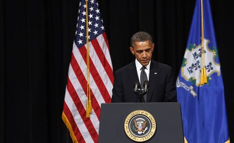 U.S. President Barack Obama speaks at a vigil held at Newtown High School for families of victims of the Sandy Hook Elementary School shooti U.S. President Barack Obama speaks at a vigil held at Newtown High School for families of victims of the Sandy Hook Elementary School shooti